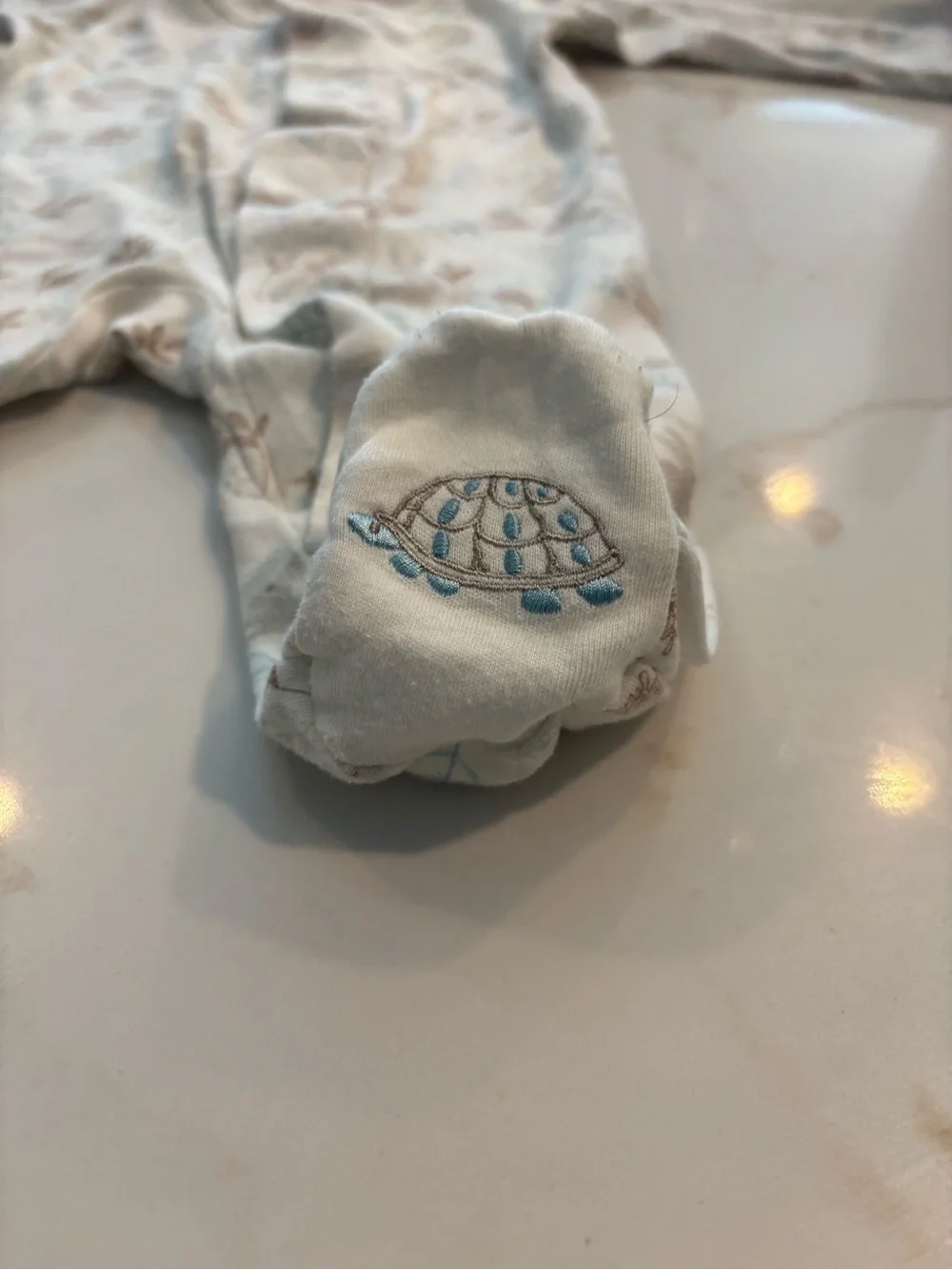 Magnetic Me Cream Footed Pajamas with Brown and Light Blue Floral Pattern